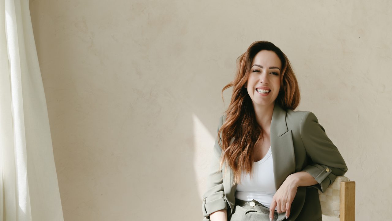 Jasmin Baker relaxed and at ease during a calm clinical hypnotherapy session