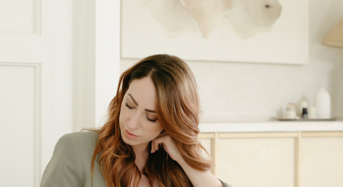 Clinical hypnotherapist preparing session notes for a client